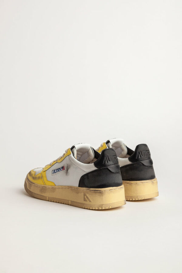 AUTRY-MEDALIST LOW SNEAKERS IN LEATHER COLOR WHITE YELLOW BLACK